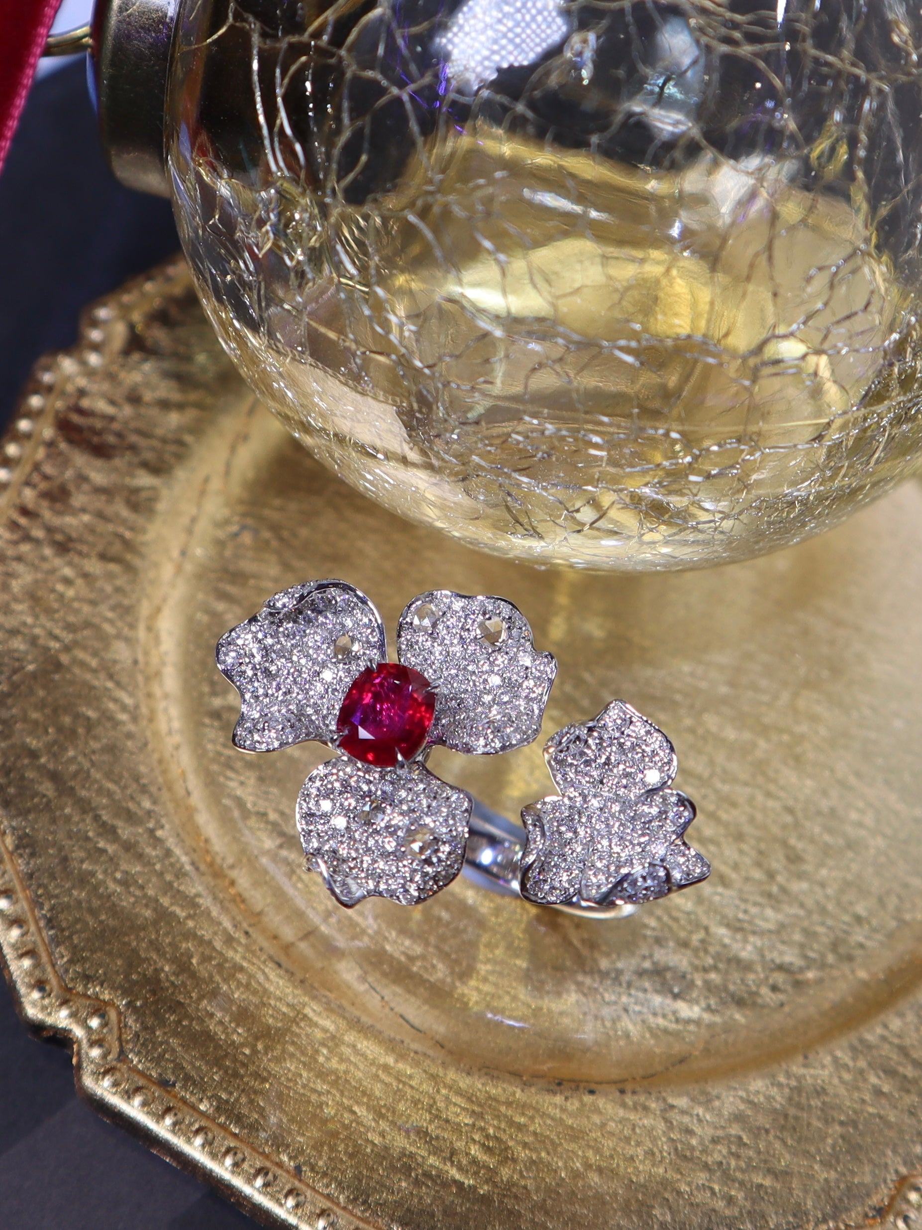 Ruby and diamond flower ring in the atelier